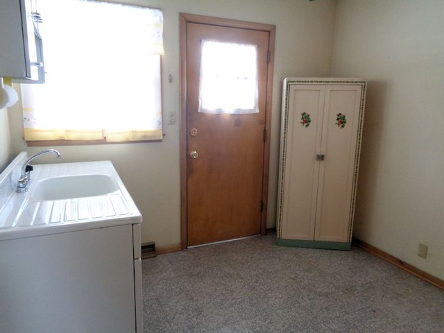 102 Cleveland Avenue Rochelle, IL 61068 - Photo 11 of 14 a view of utility room