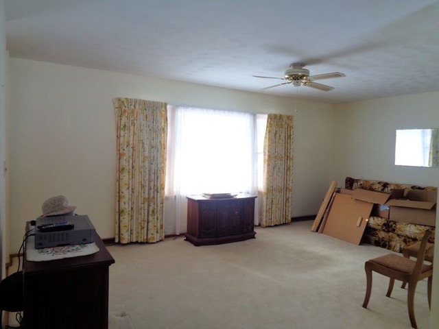 102 Cleveland Avenue Rochelle, IL 61068 - Photo 5 of 14 a bedroom with furniture and a window