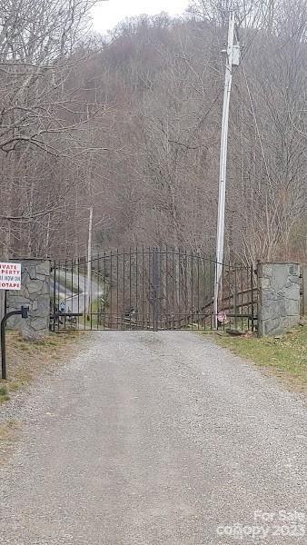 0 Poplar Cove Road Clyde, NC 28721 - Photo 14 of 17 a view of basketball area with fence
