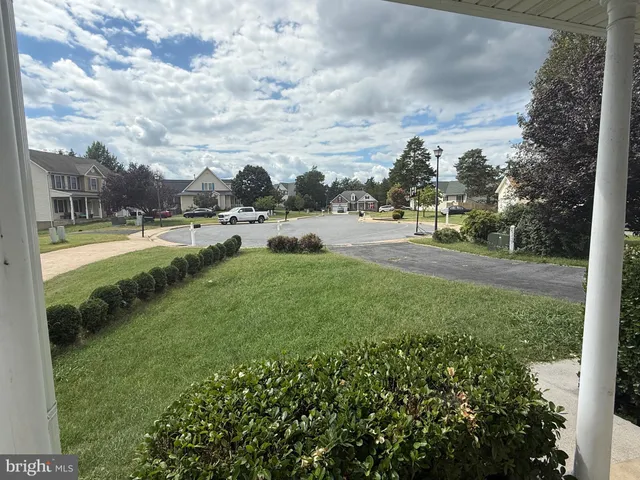 a view of a garden and basketball court