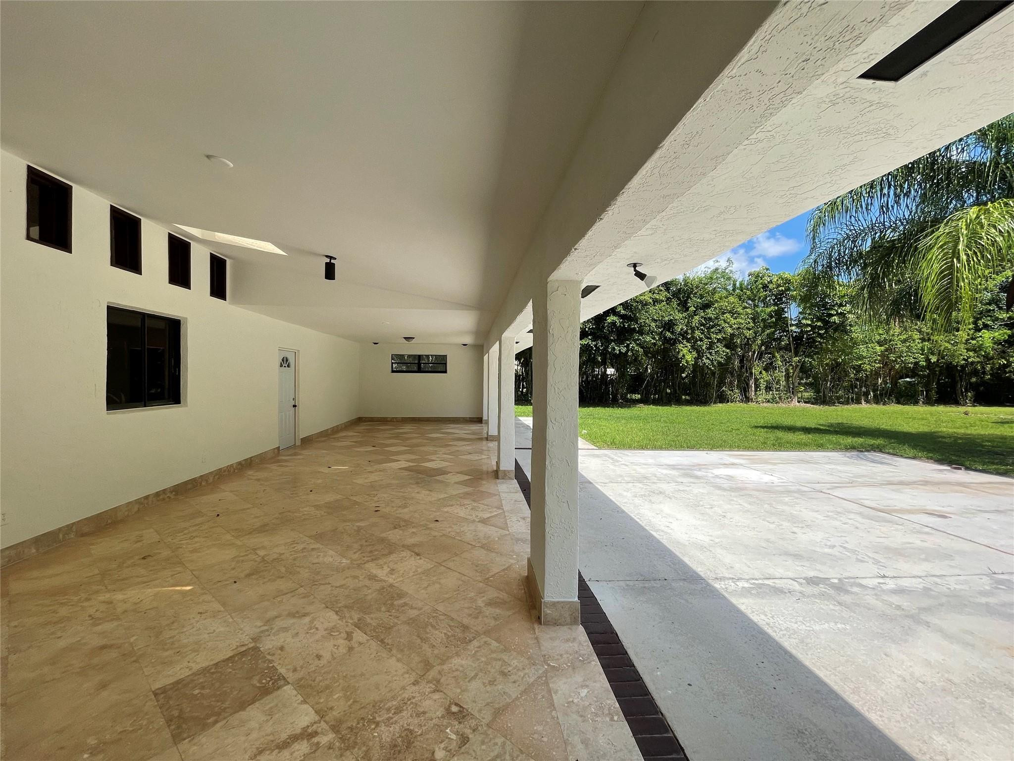 16881 Southwest 276th Street Homestead, FL 33031 - Photo 14 of 17 a view of an outdoor space