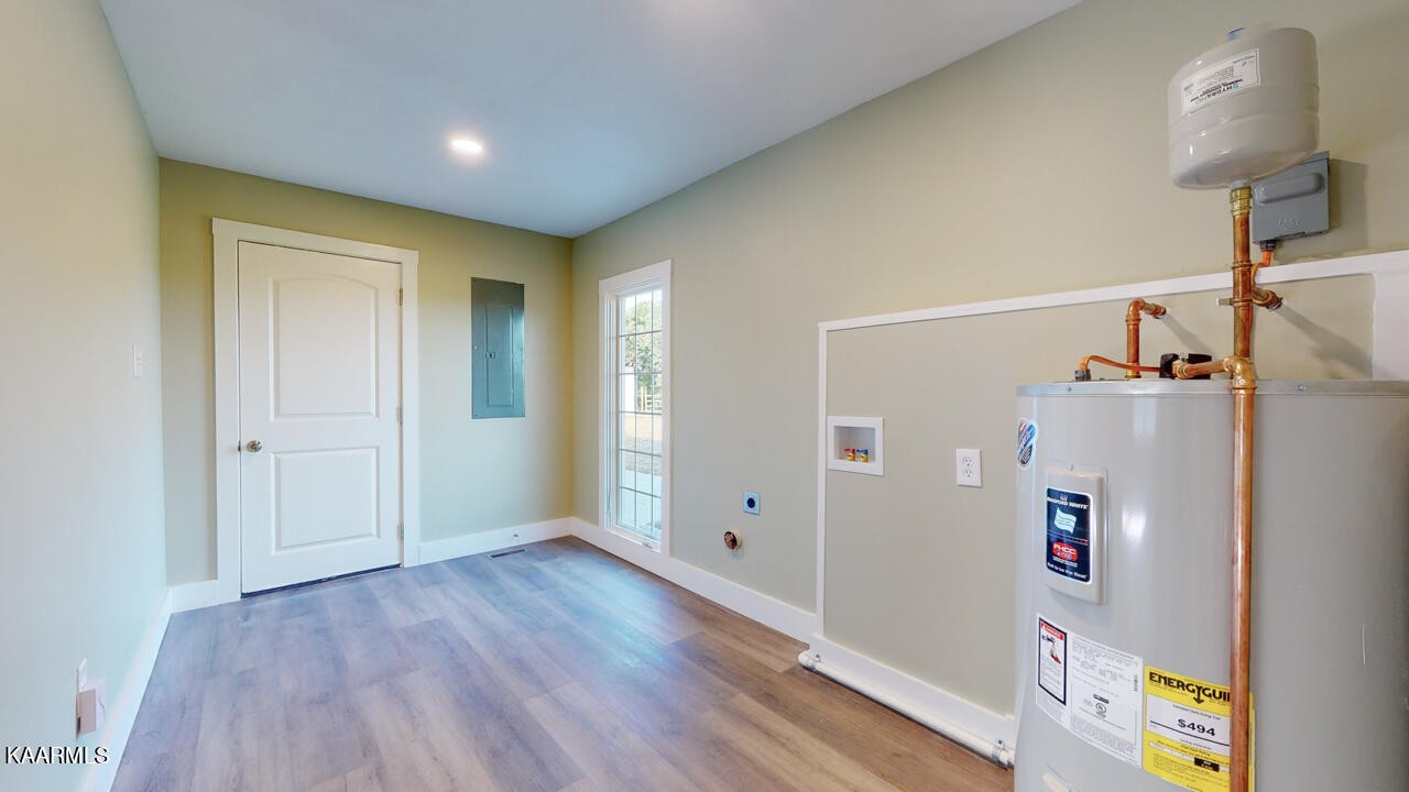 3877 Riverview Road Lenoir City, TN 37771 - Photo 16 of 47 a view of empty room with wooden floor