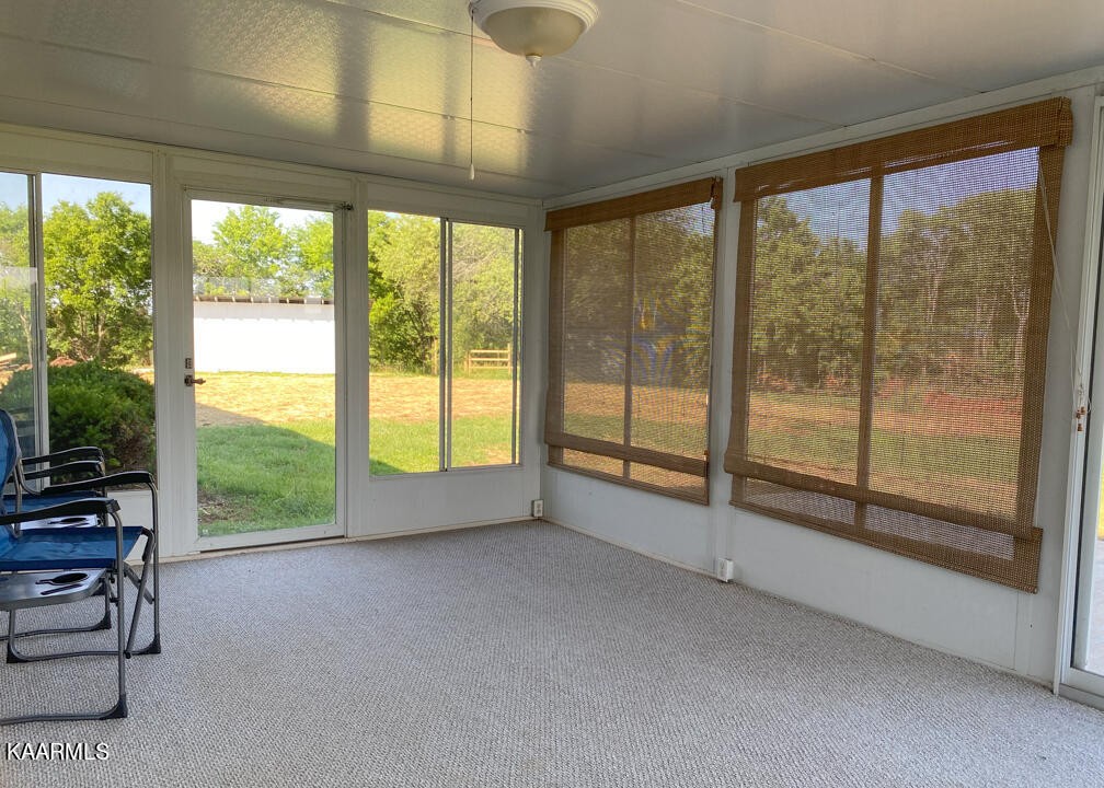 3877 Riverview Road Lenoir City, TN 37771 - Photo 33 of 47 a view of room with window and floor to ceiling window