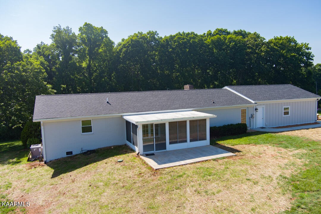 3877 Riverview Road Lenoir City, TN 37771 - Photo 35 of 47 front view of a house with a yard