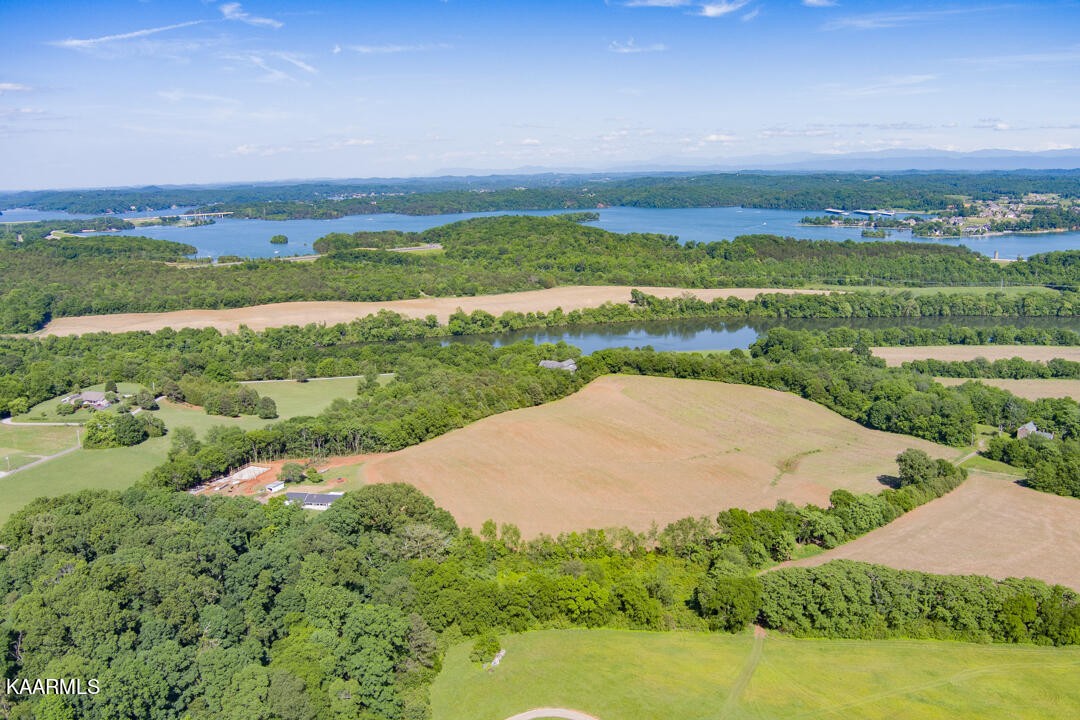 3877 Riverview Road Lenoir City, TN 37771 - Photo 38 of 47 an aerial view of a houses with yard and lake view