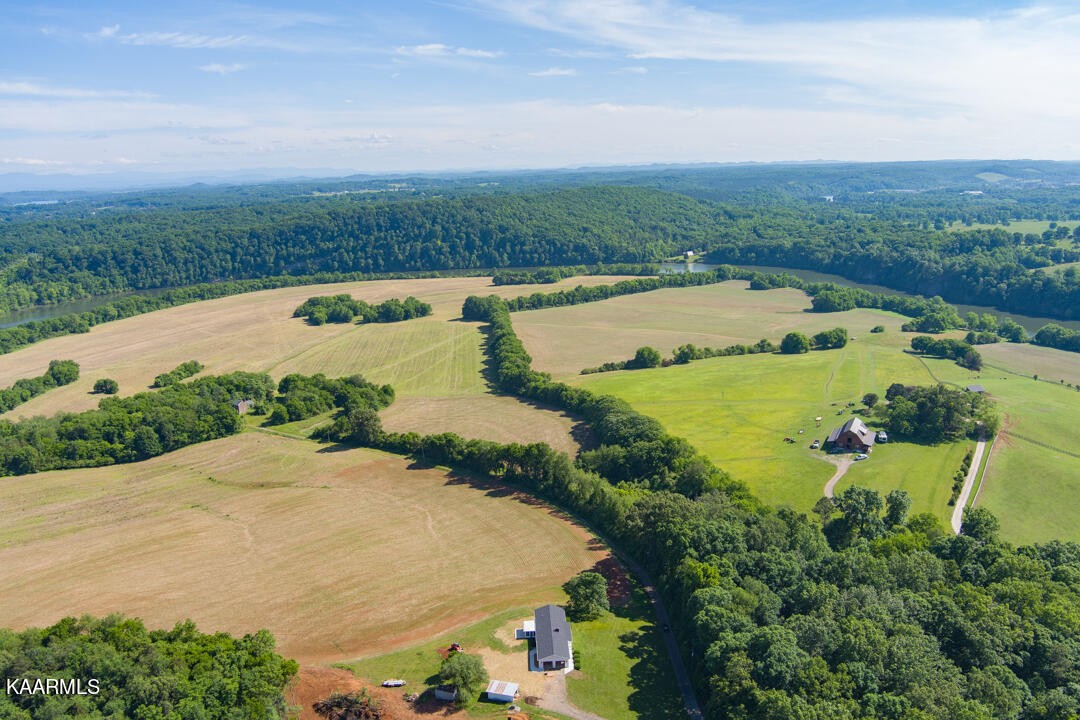 3877 Riverview Road Lenoir City, TN 37771 - Photo 39 of 47 an aerial view of ocean with residential house and outdoor space