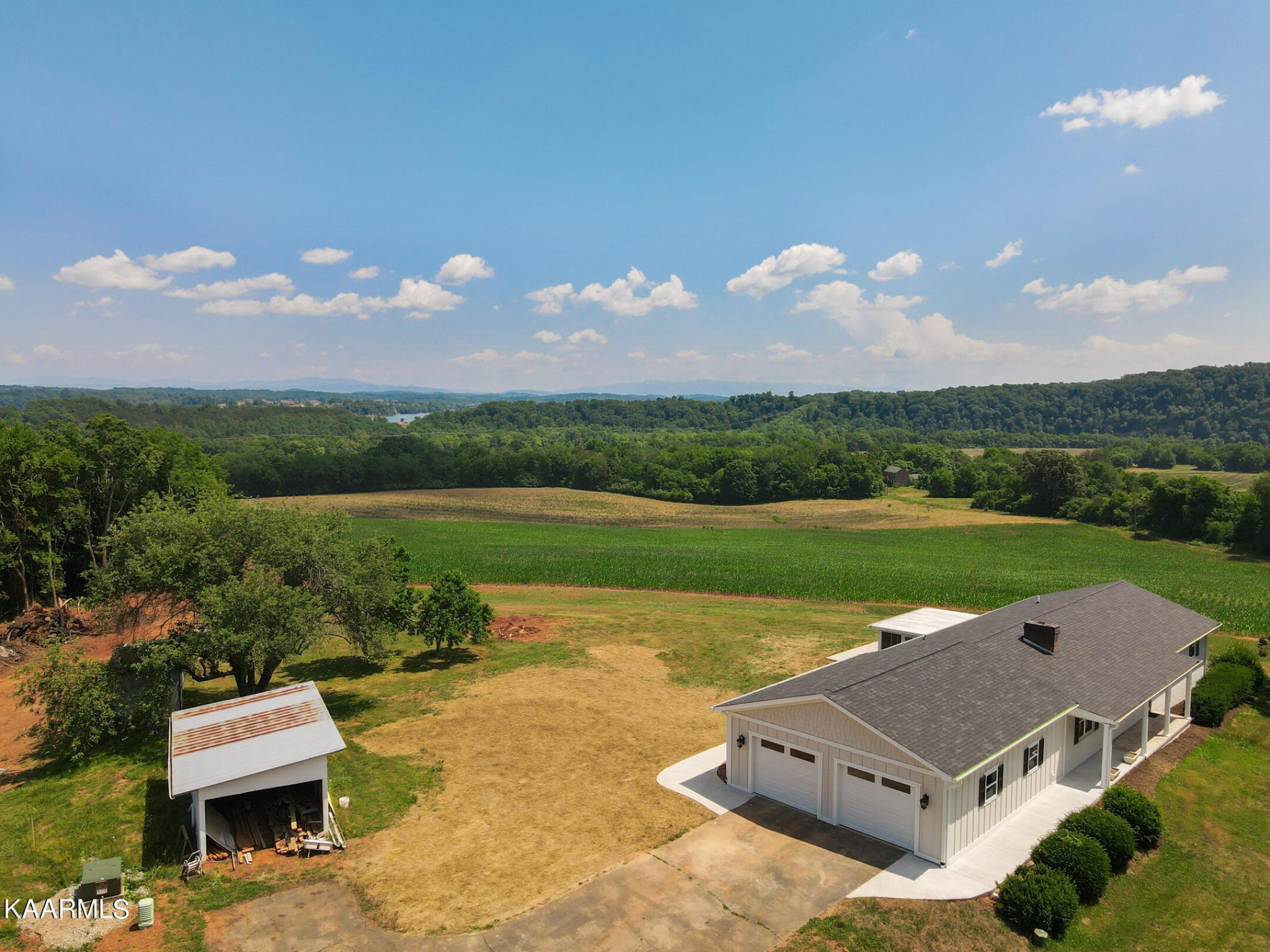 3877 Riverview Road Lenoir City, TN 37771 - Photo 42 of 47 an aerial view of a house with garden space and ocean view