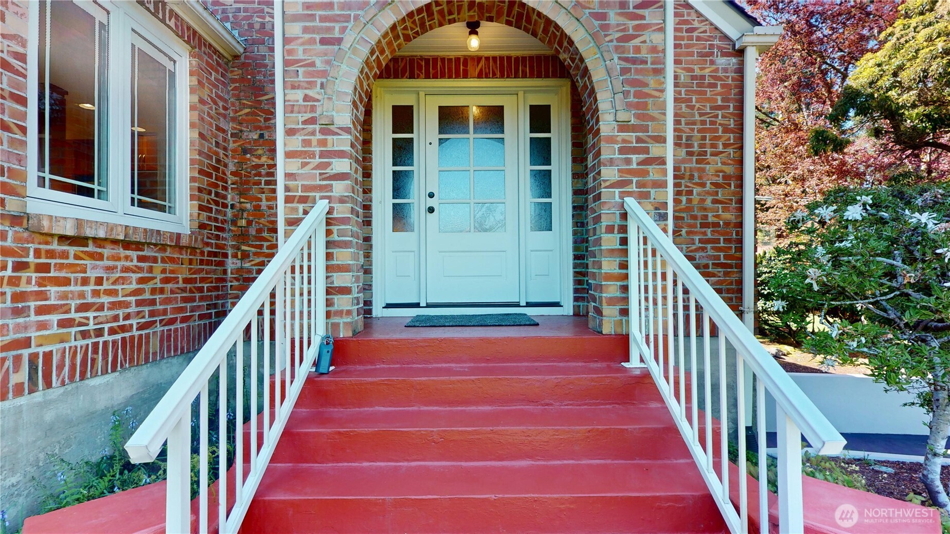 1533 Northeast Tagholm Road Poulsbo, WA 98370 - Photo 2 of 40 a view of front door of house with stairs