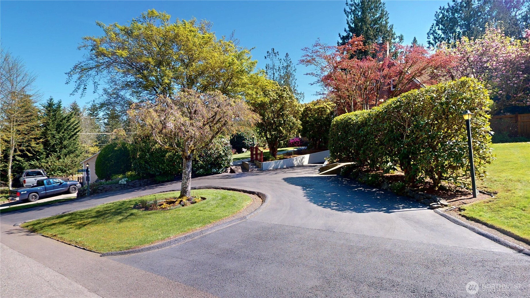 1533 Northeast Tagholm Road Poulsbo, WA 98370 - Photo 37 of 40 a swimming pool with plants and trees