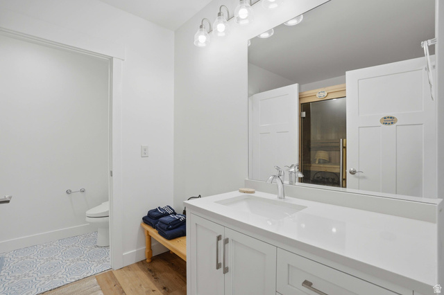 2450 Snake Creek Road Midway, UT 84049 - Photo 21 of 34 Full bathroom with vanity and light wood-style flooring