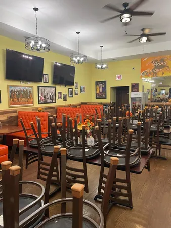 a view of a dining room with furniture