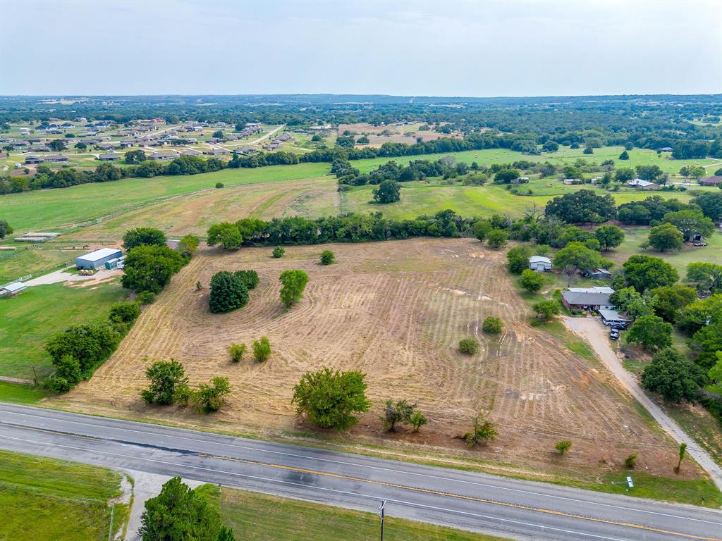 2151 West Highway 199 Springtown, TX 76082 - Photo 4 of 16 an aerial view of a house with yard