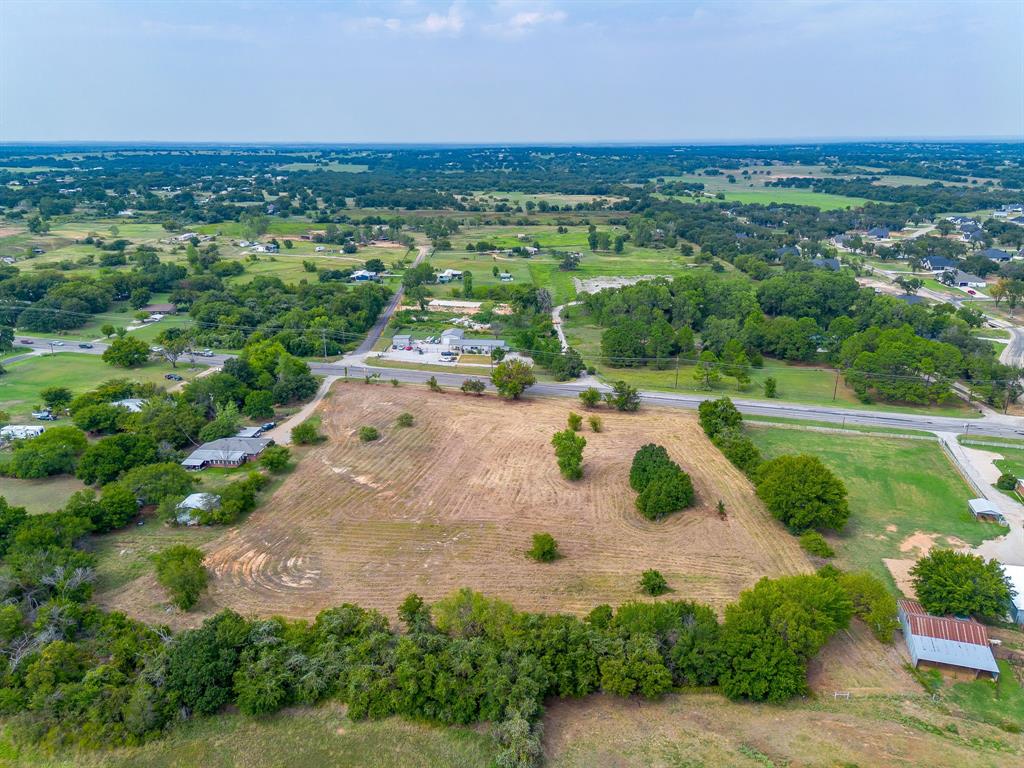 2151 West Highway 199 Springtown, TX 76082 - Photo 8 of 16 an aerial view of a house with a yard