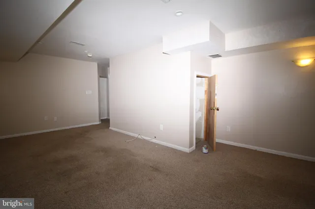 a view of a livingroom with a staircase