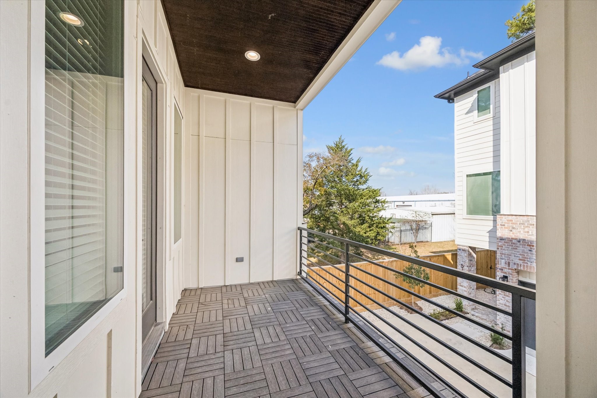 520 Janisch Road Houston, TX 77018 - Photo 13 of 28 a view of a balcony with wooden floor