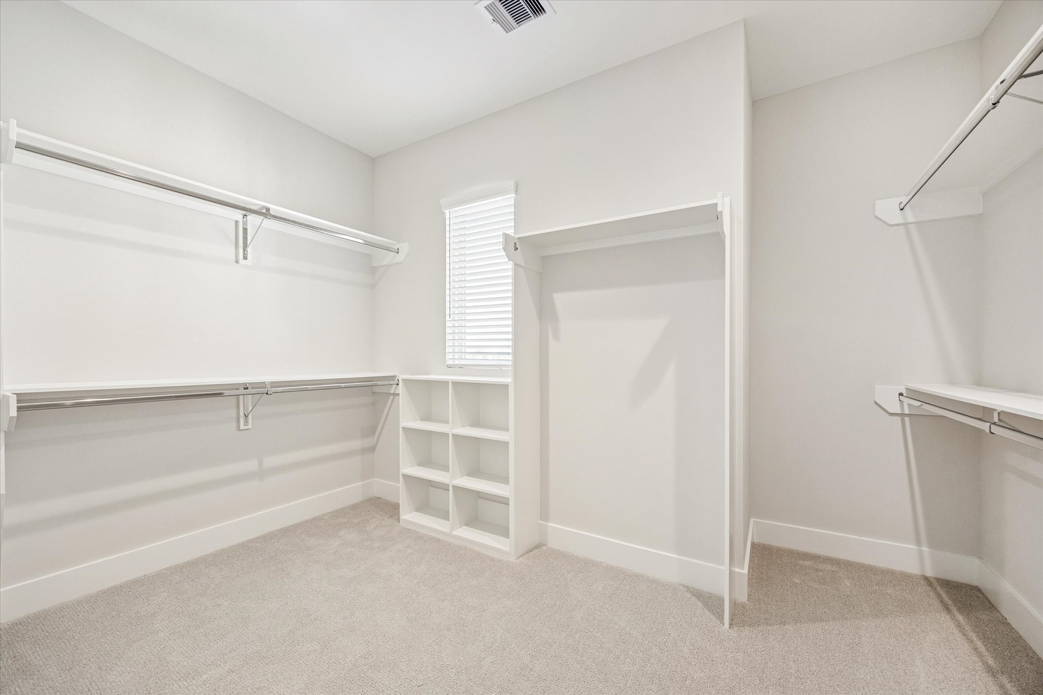 520 Janisch Road Houston, TX 77018 - Photo 16 of 28 a view of an empty walk in closet