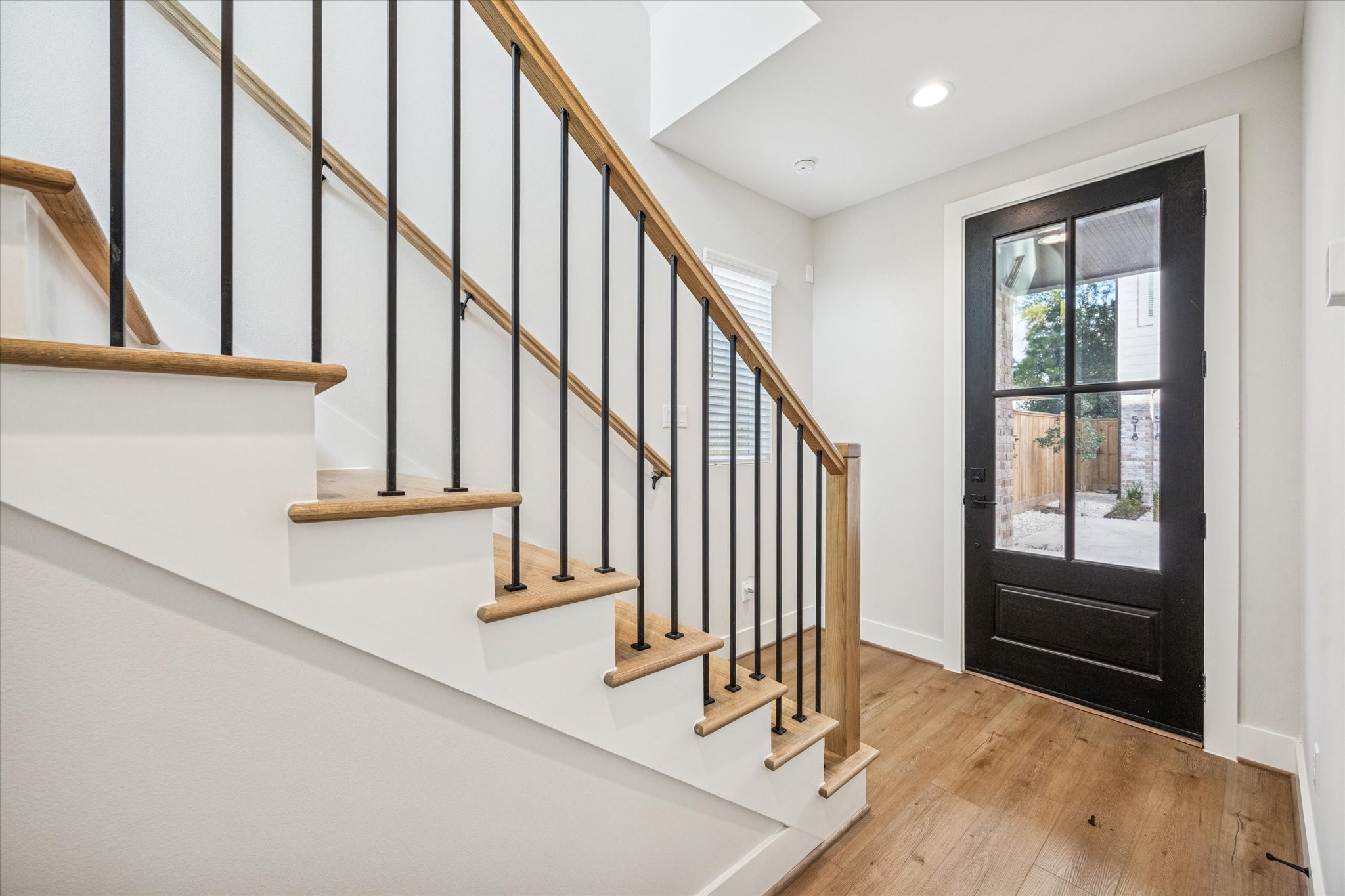 520 Janisch Road Houston, TX 77018 - Photo 25 of 28 a view of entryway and hall with wooden floor