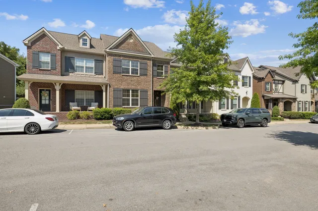 a view of a street in front of a building