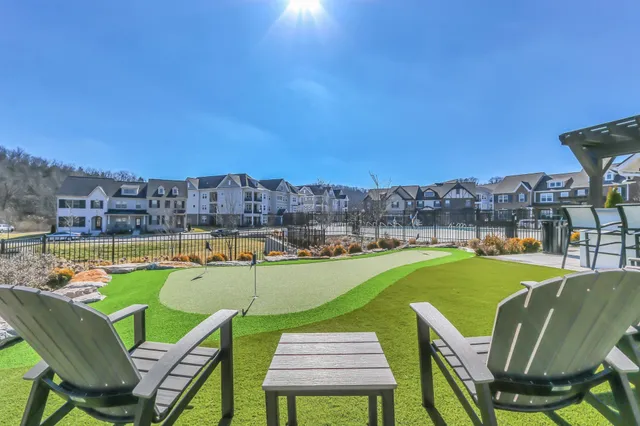 a view of a chairs and table on the terrace