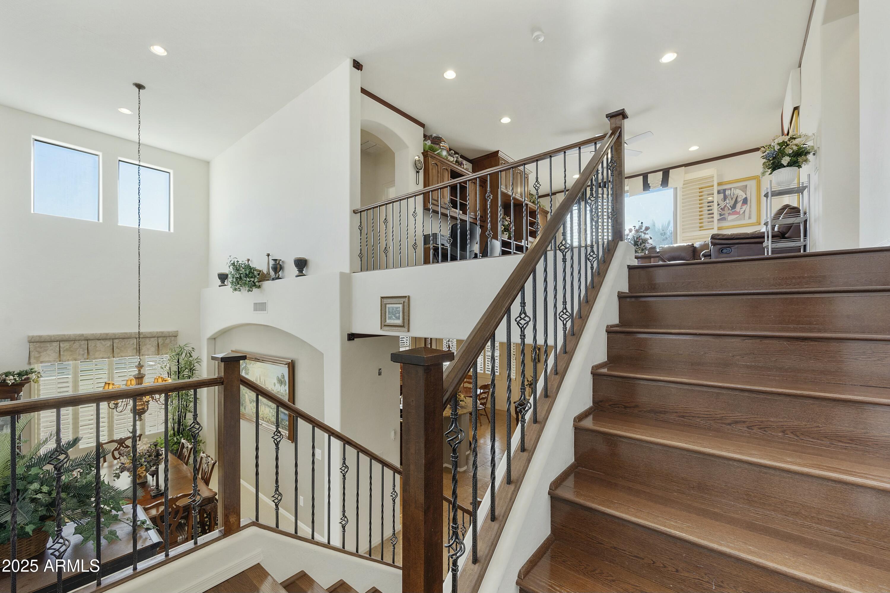 4615 West Corral Road Laveen, AZ 85339 - Photo 27 of 48 a view of entryway with wooden floor and stairs