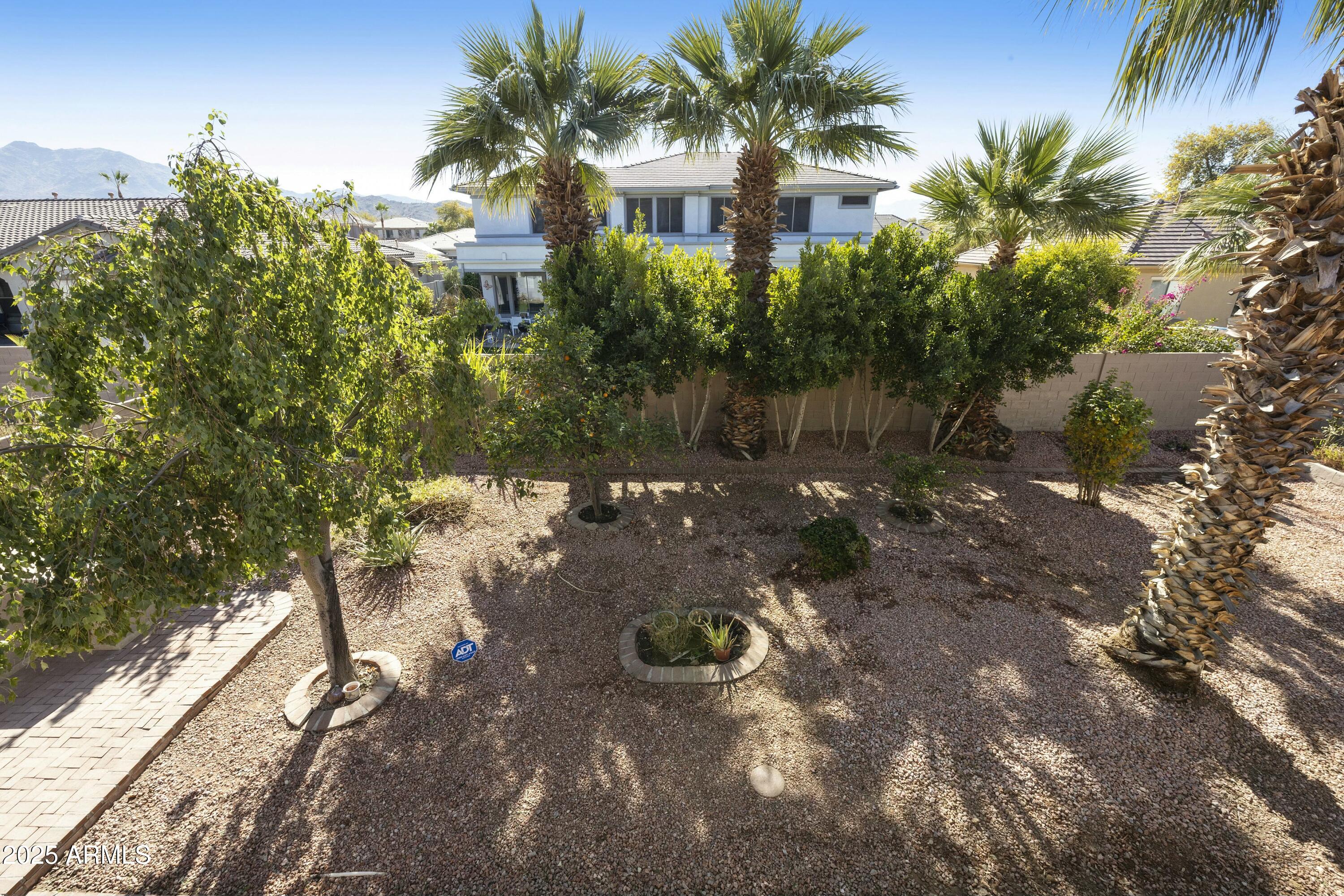 4615 West Corral Road Laveen, AZ 85339 - Photo 33 of 48 a front view of a house with a yard