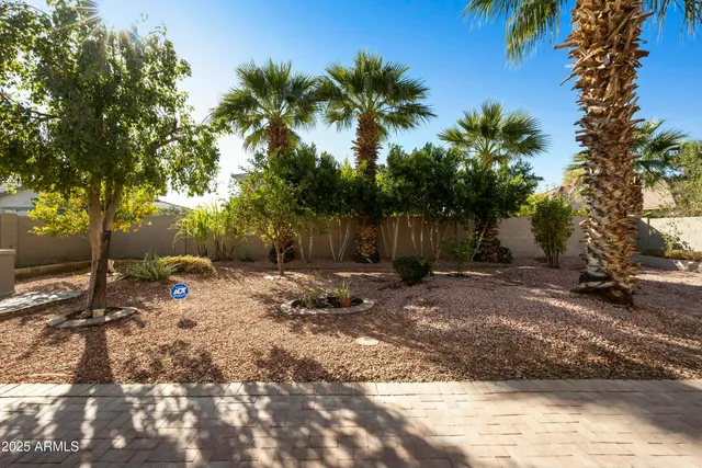 a backyard of a house with lots of green space