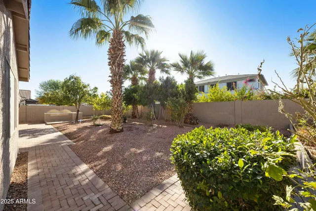 a view of a backyard with a garden