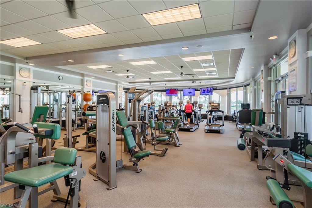 7221 Bellini Way Naples, FL 34114 - Photo 35 of 43 a view of a room with gym equipment