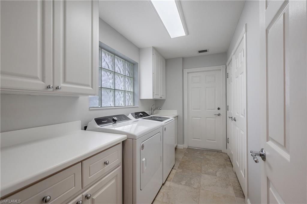 7221 Bellini Way Naples, FL 34114 - Photo 6 of 43 a view of a kitchen with cabinets