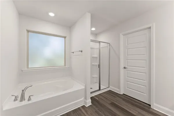 a bathroom with a double vanity sink mirror and