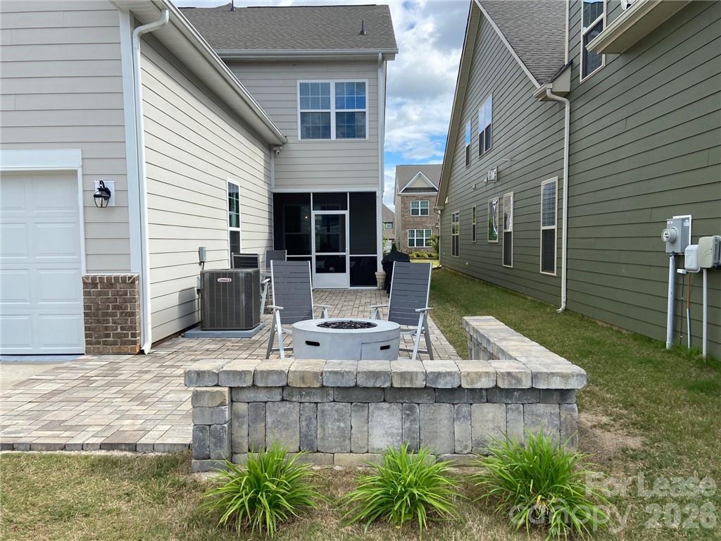 6434 Raffia Road Charlotte, NC 28277 - Photo 19 of 32 a view of a house with backyard and sitting area