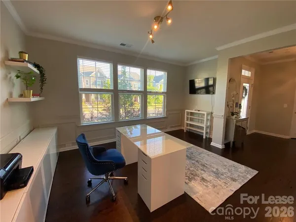 a room with furniture and a window