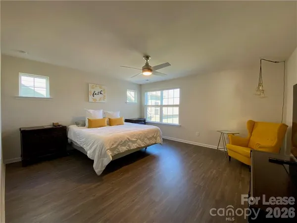 a bathroom with a double vanity sink and mirror