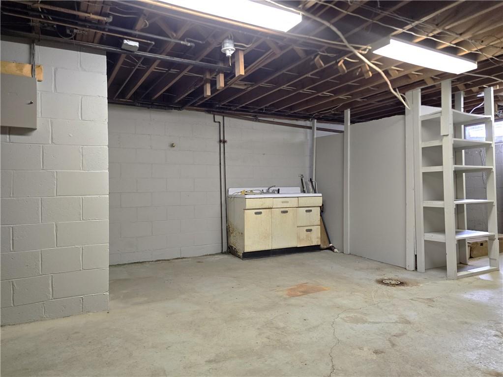 770 Pittsburgh Road Butler, PA 16002 - Photo 21 of 32 a utility room with cabinets