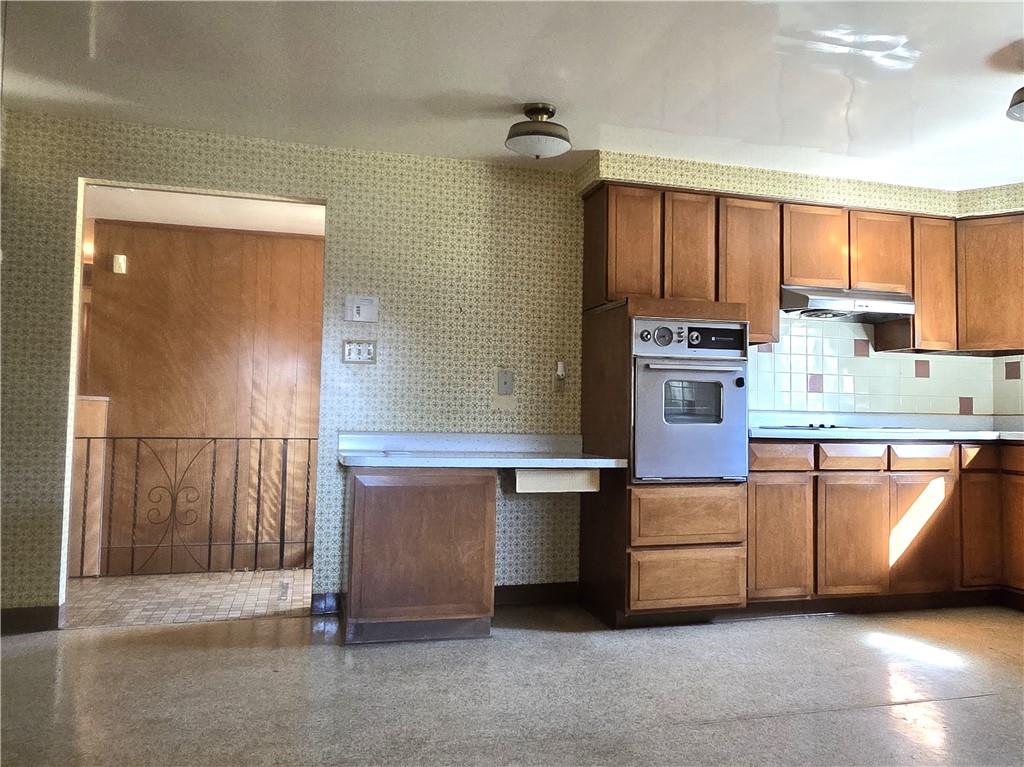 770 Pittsburgh Road Butler, PA 16002 - Photo 6 of 32 a kitchen with stainless steel appliances a refrigerator and a stove top oven