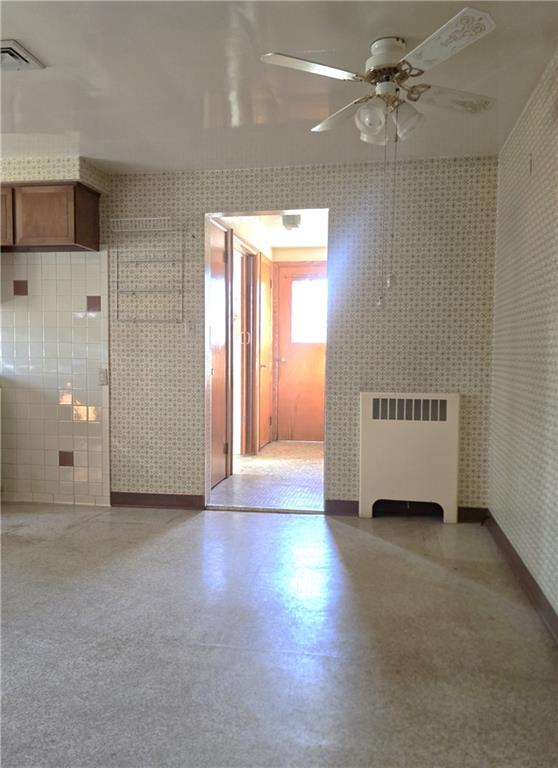 770 Pittsburgh Road Butler, PA 16002 - Photo 7 of 32 a view of a livingroom with a ceiling fan and window