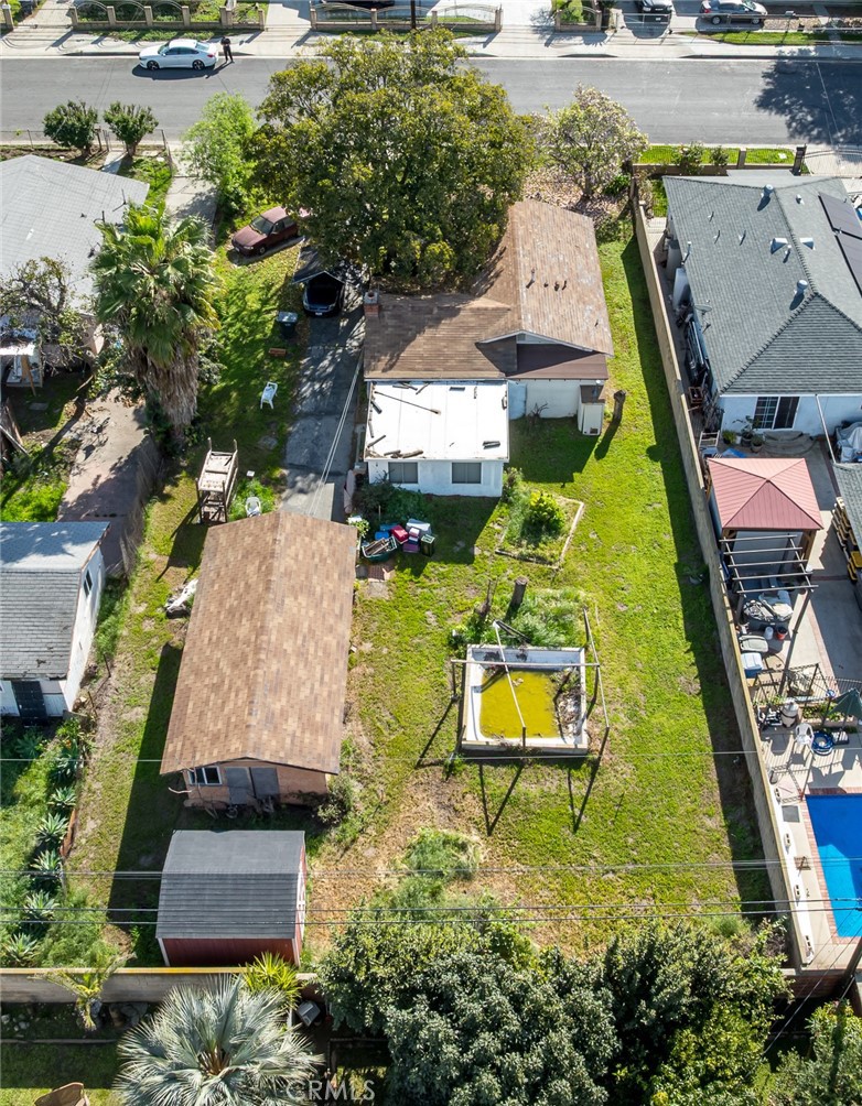 2227 Burkett Road El Monte, CA 91732 - Photo 5 of 7 Aeiral view of backyard. Storage shed behind garage and container pond.