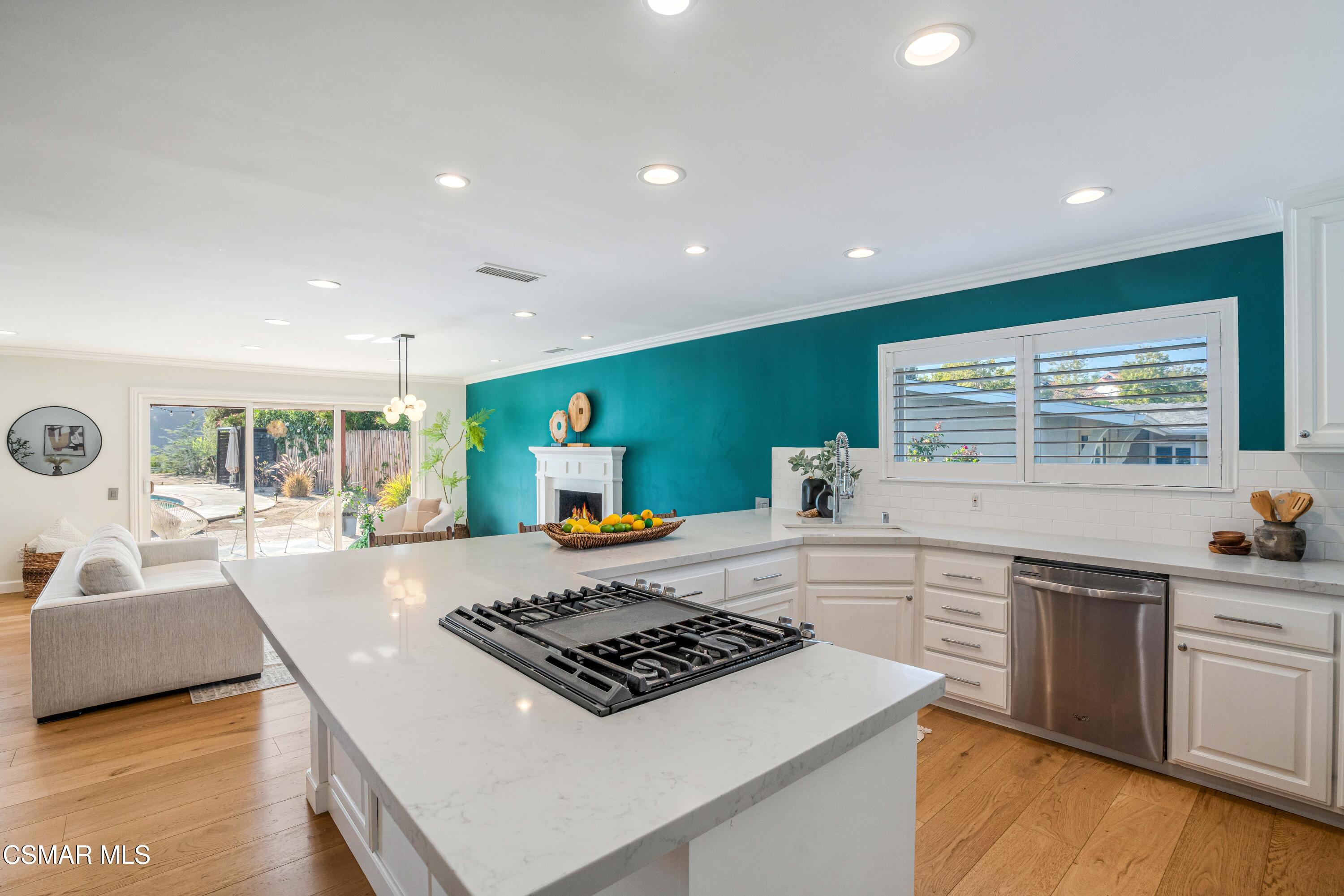 5839 Parkmor Road Calabasas, CA 91302 - Photo 13 of 42 a kitchen with a stove and a sink
