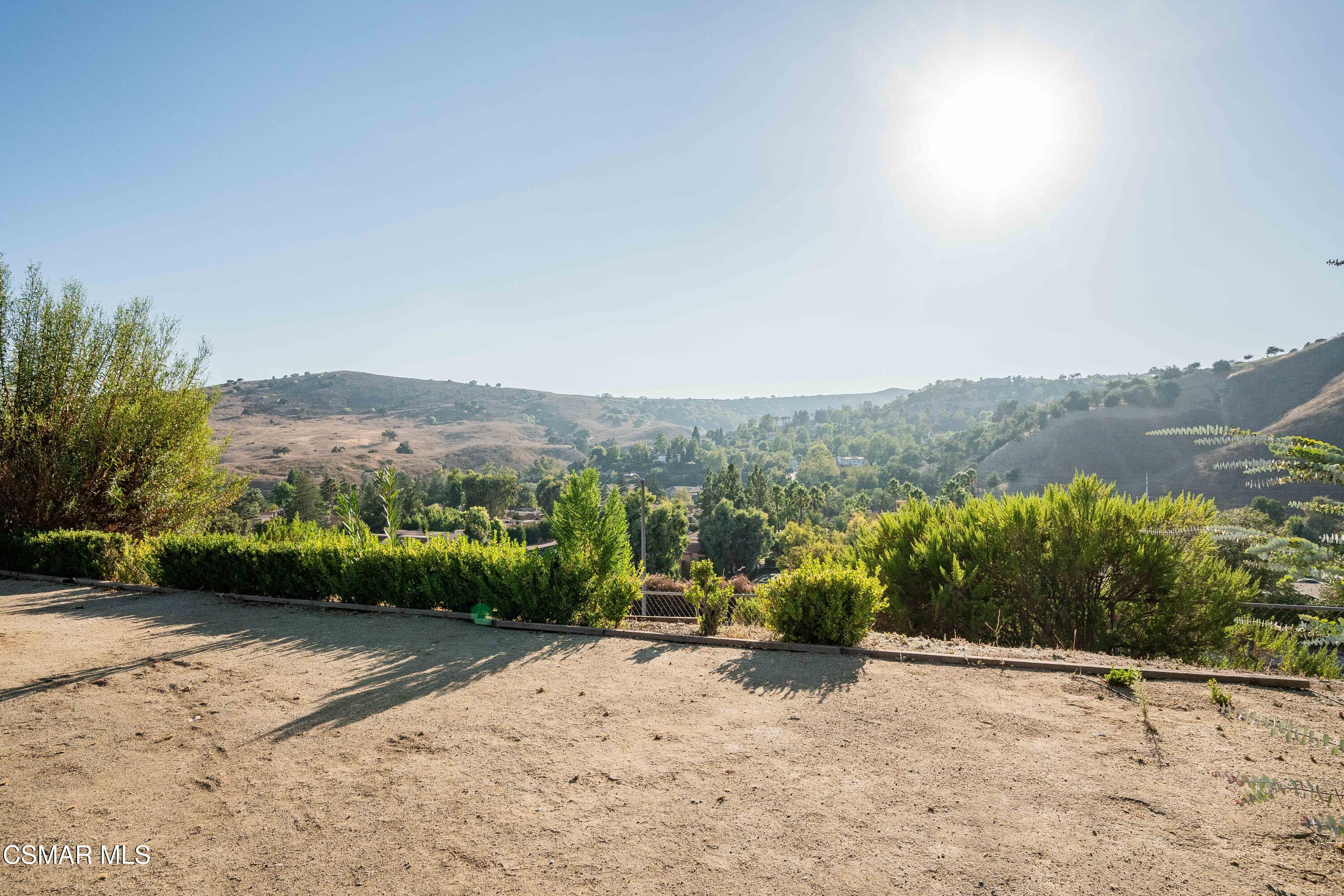 5839 Parkmor Road Calabasas, CA 91302 - Photo 41 of 42 a view of a dry yard with mountain