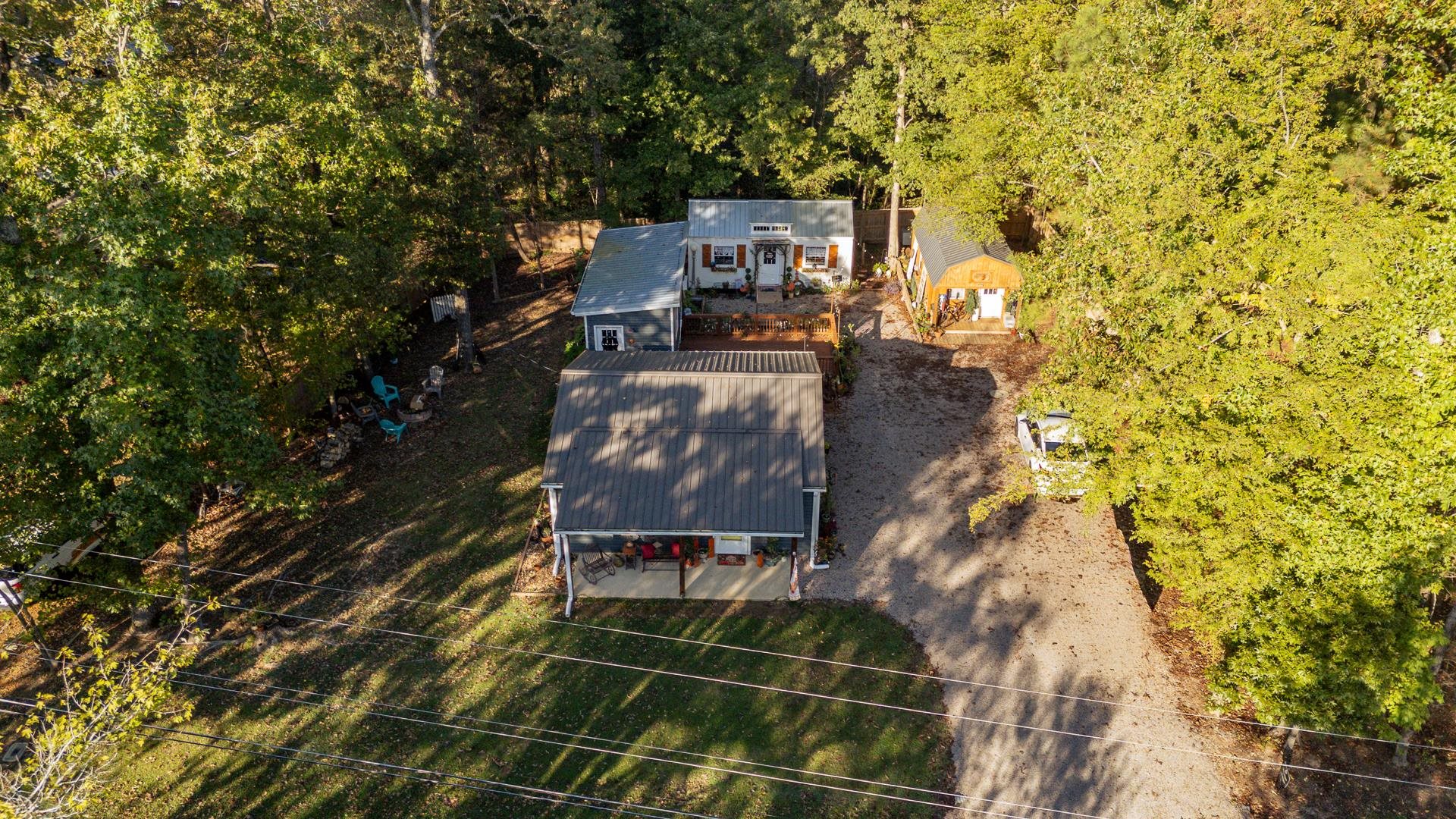 225 Lew Wallace Road Crump, TN 38327 - Photo 38 of 40 a picture of a wall with a bench