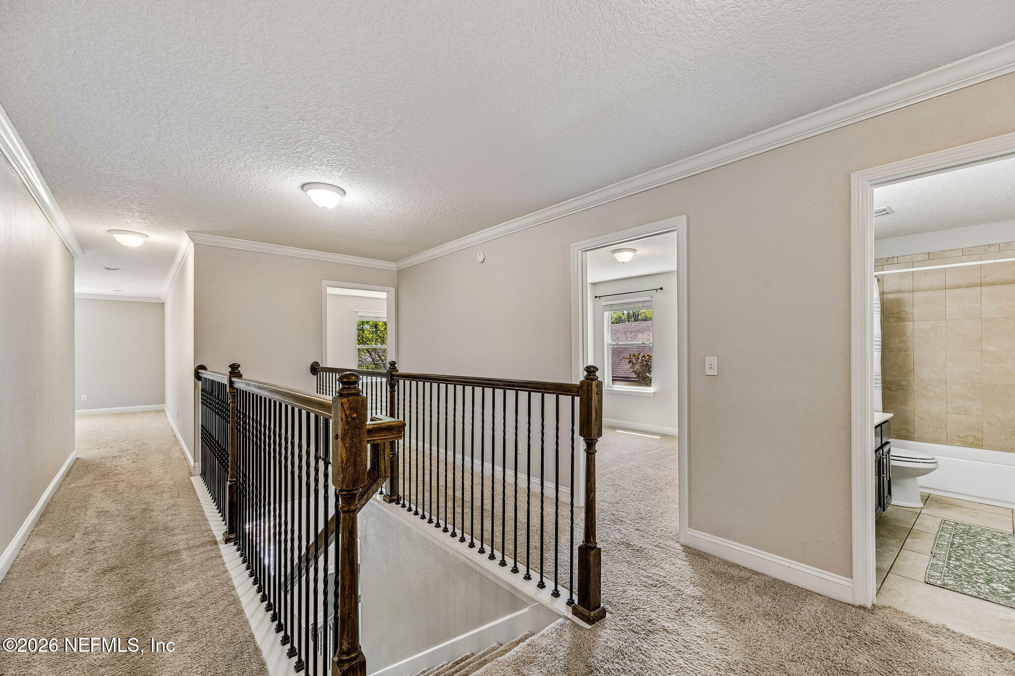 12198 Ridge Crossing Way Jacksonville, FL 32226 - Photo 35 of 67 a view of a hallway with closet and stairs