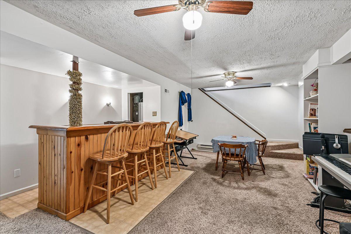 2894 Dungate Road Pasadena, MD 21122 - Photo 25 of 39 Cozy basement retreat with dry bar.