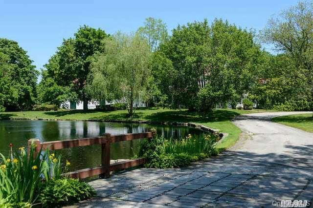 6 Cove Neck Road Cove Neck, NY 11771 - Photo 1 of 1 Enter Through the Sweeping Drive