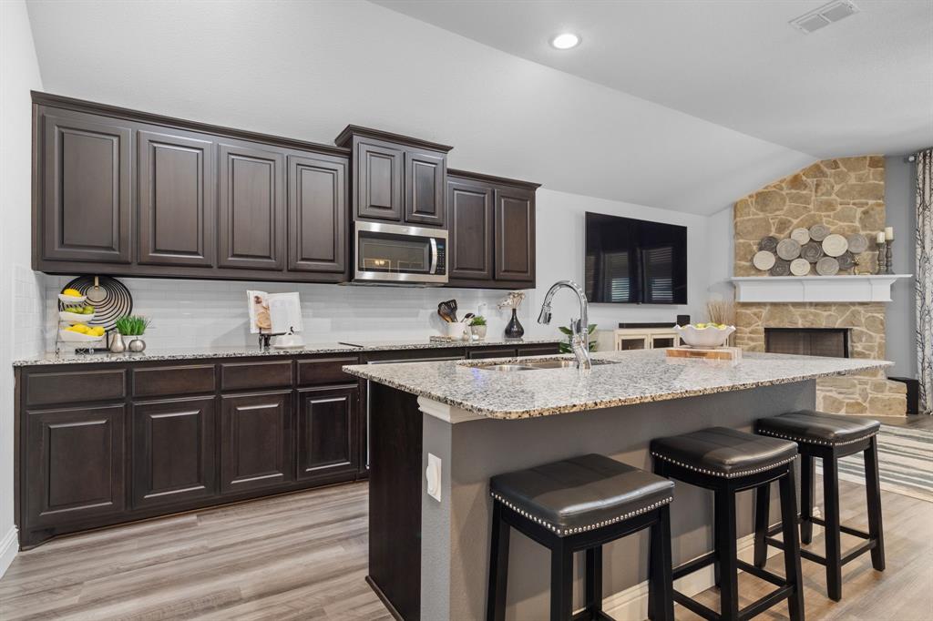 3724 Ranchers Ridge Krum, TX 76249 - Photo 9 of 32 Expansive island with additional seating!