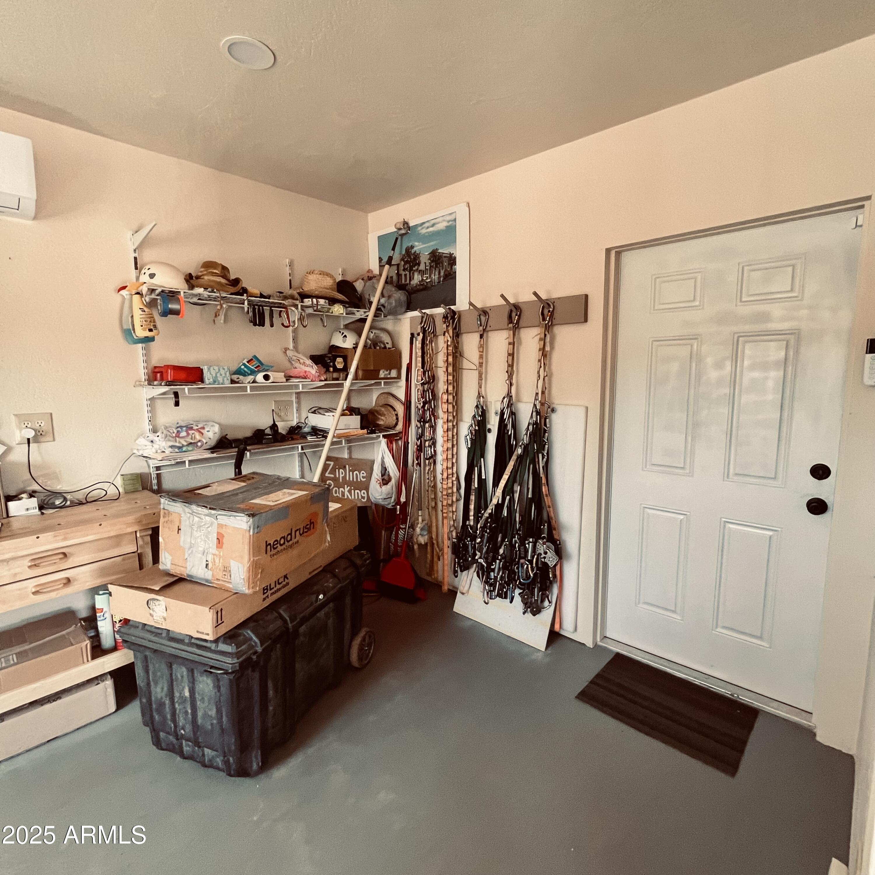 130 North 7th Street, Unit 13 Tombstone, AZ 85638 - Photo 11 of 12 a living room with furniture and a gym machine