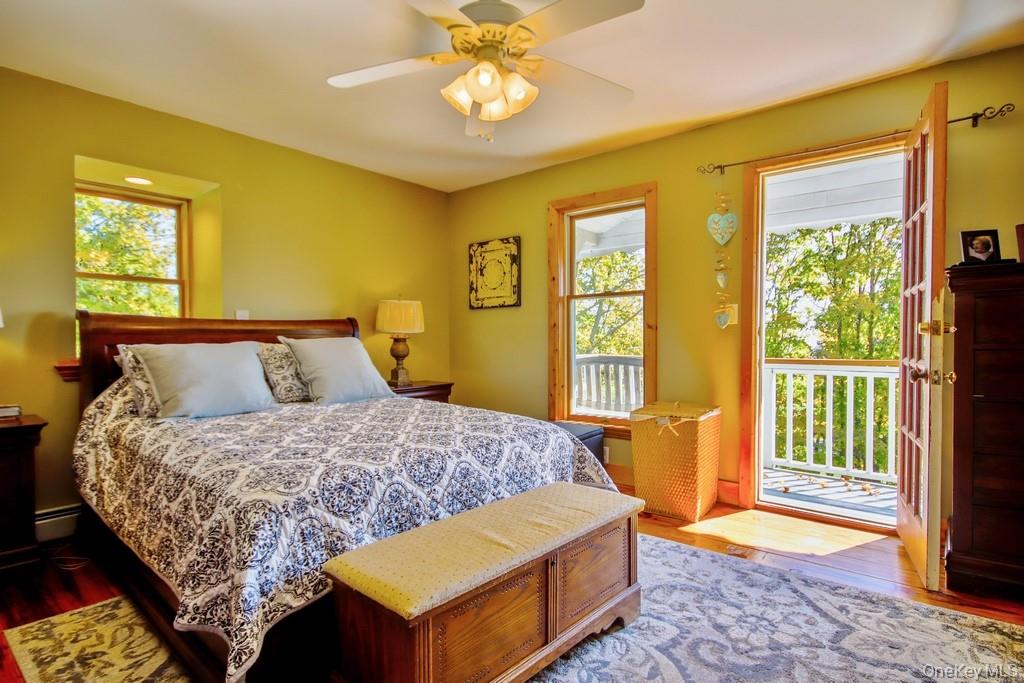 575 Roosa Gap Road Bloomingburg, NY 12721 - Photo 27 of 50 a bedroom with a bed and a window