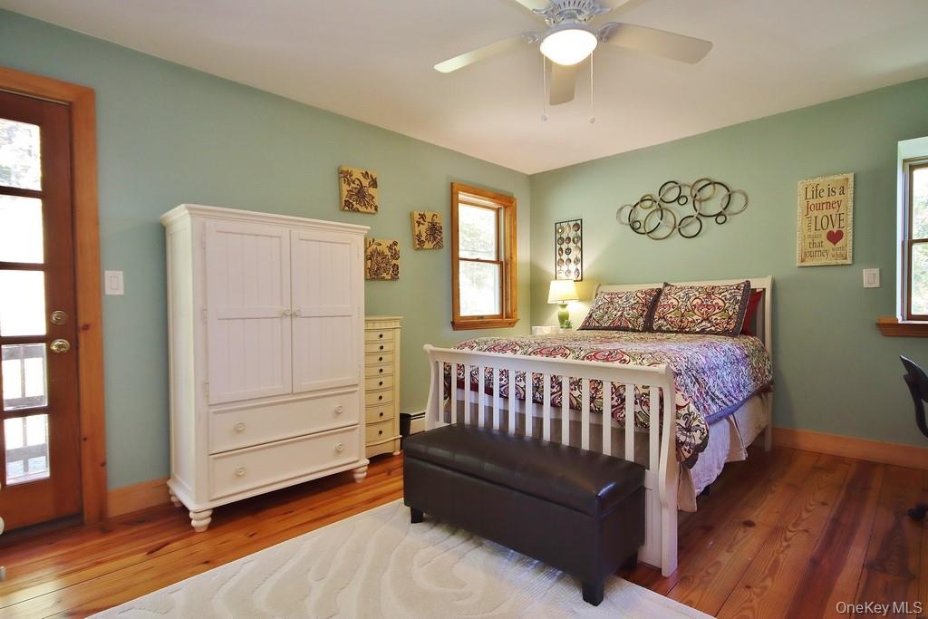 575 Roosa Gap Road Bloomingburg, NY 12721 - Photo 29 of 50 a bedroom with a bed and a window