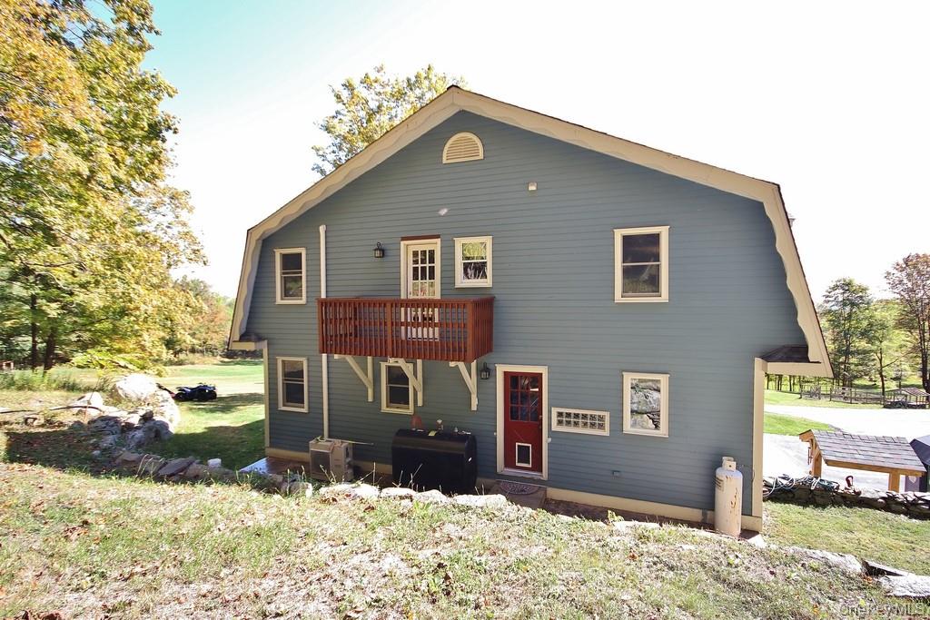 575 Roosa Gap Road Bloomingburg, NY 12721 - Photo 3 of 50 a front view of a house with a yard