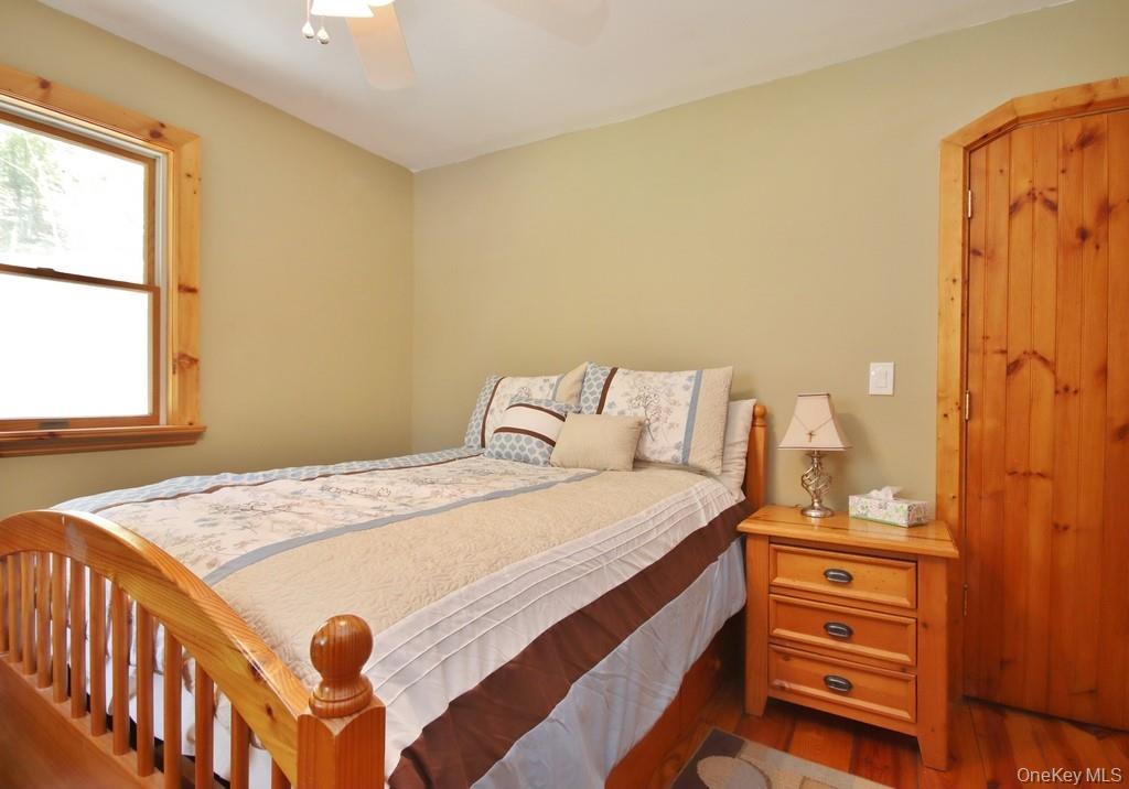 575 Roosa Gap Road Bloomingburg, NY 12721 - Photo 36 of 50 a bedroom with a bed and a dresser
