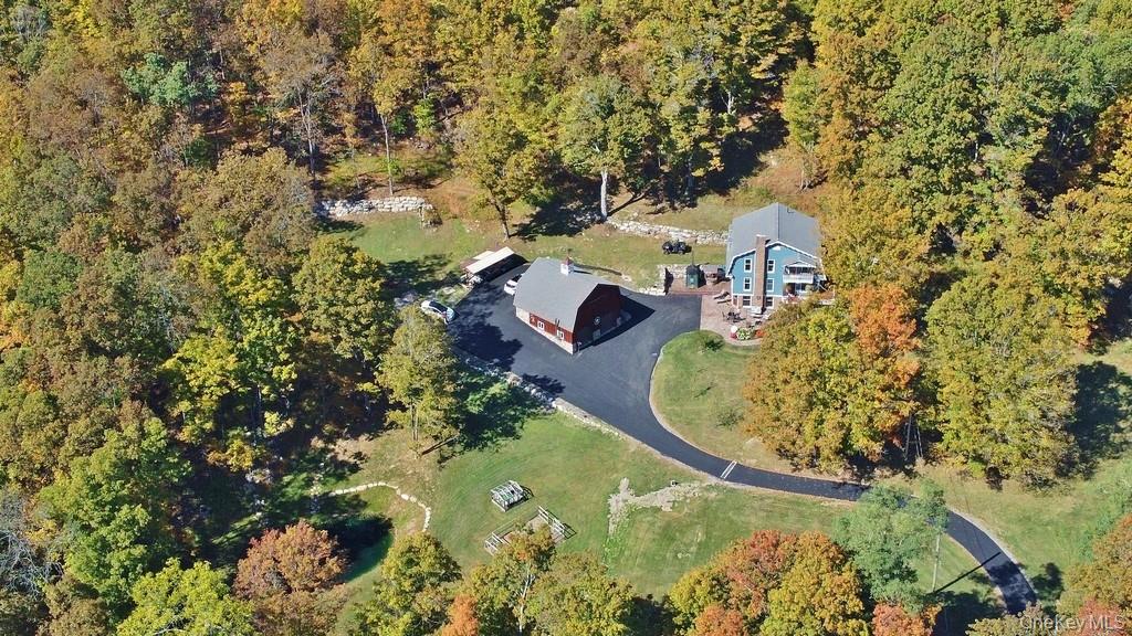 575 Roosa Gap Road Bloomingburg, NY 12721 - Photo 43 of 50 an aerial view of a house with a yard and large trees